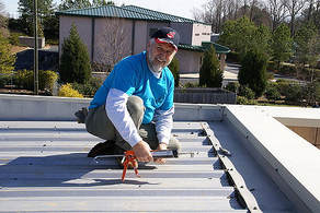 Installing a Flat Metal Roof Henrico Roofing VA